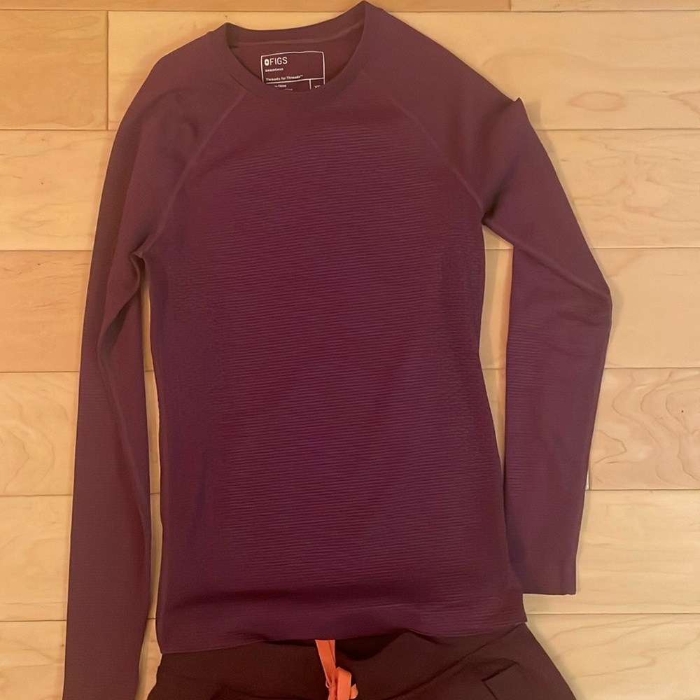 Eggplant colored pants and long sleeve figs top